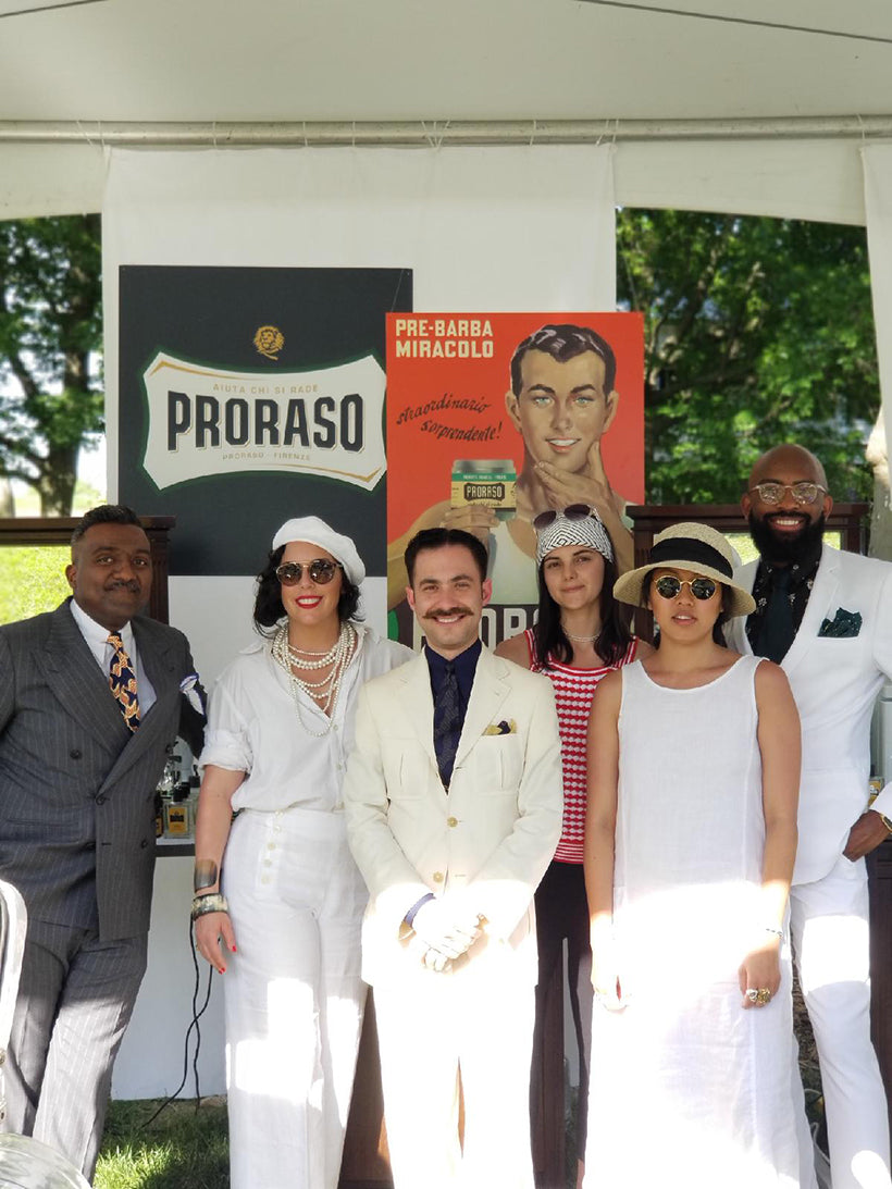 Team Proraso dressed in vintage clothing posing for the camera